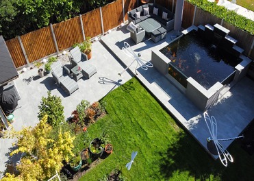 garden design, porcelain patio, koi pond, fencing and lawn, landscaping in essex